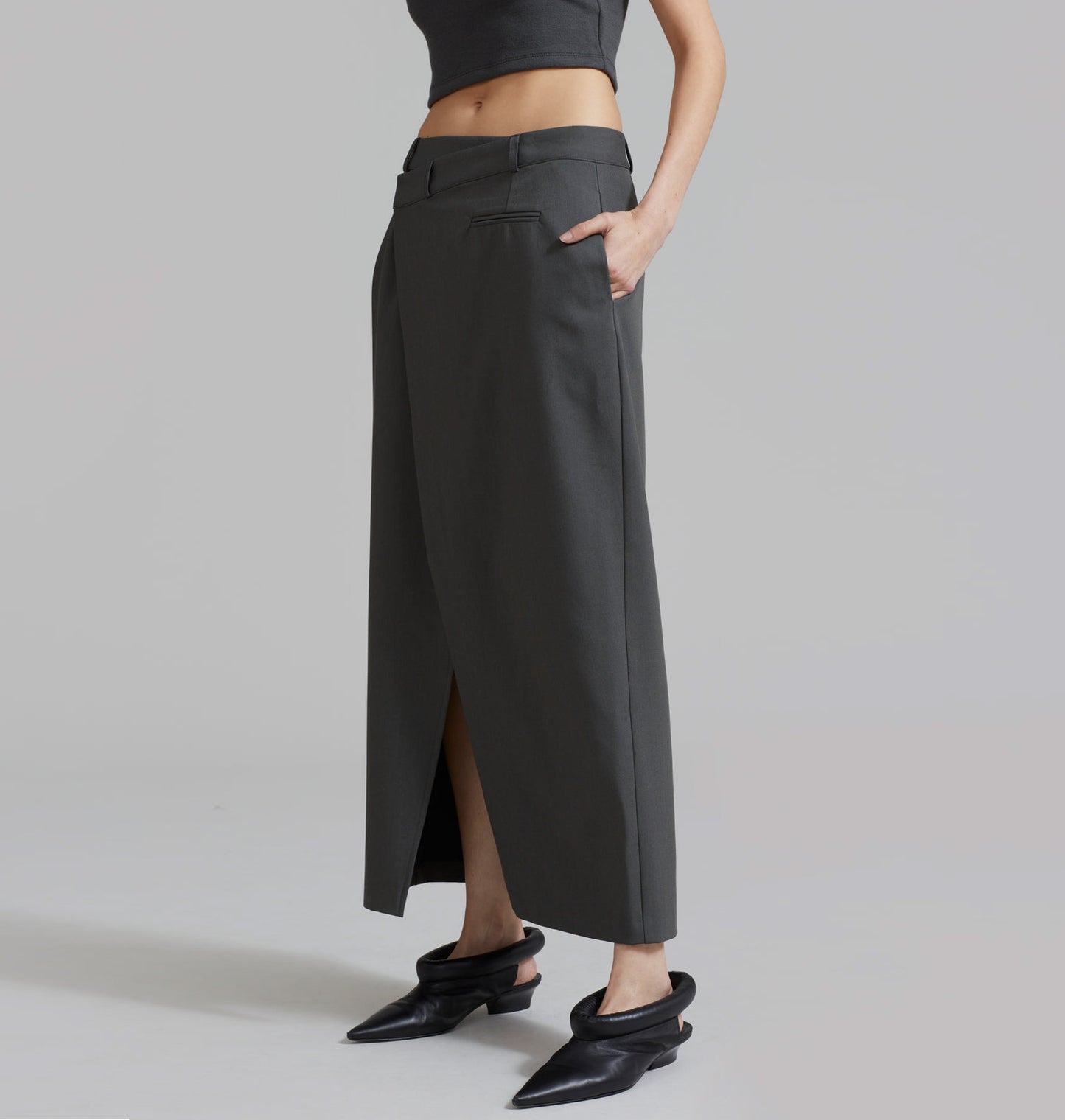 Asymmetrical waist tailored wrap skirt.