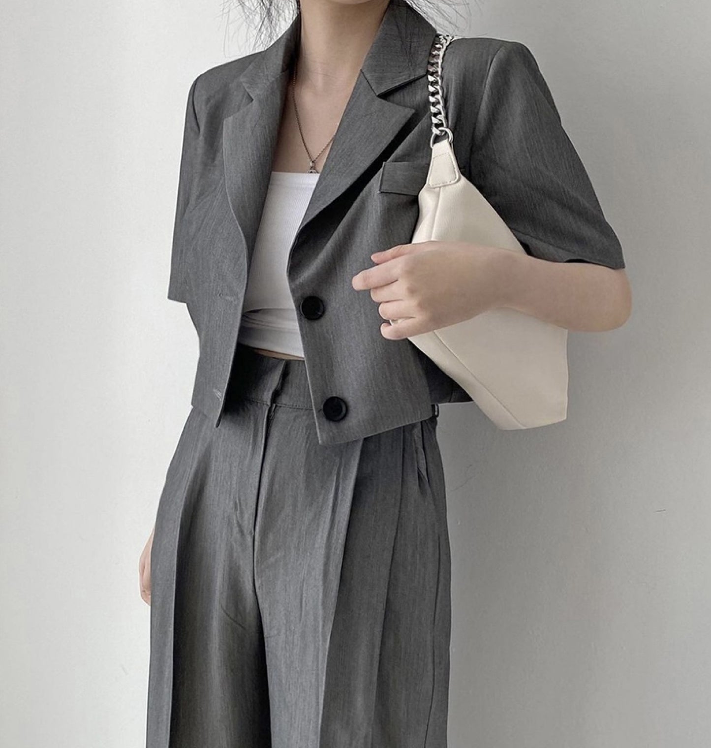 Half sleeve crop blazer with pleated trousers