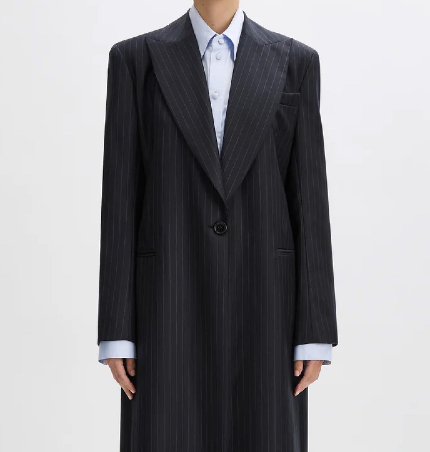 Peak lapel tailored unisex overcoat.