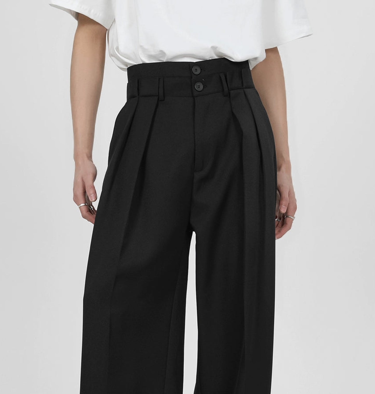 Black wide leg pleated unisex trouser.